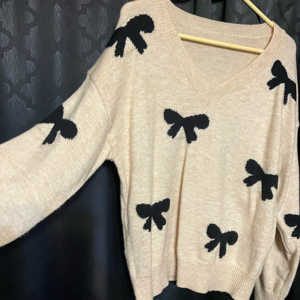 SHEIN Beige V-Neck Sweater with Black Bow Details